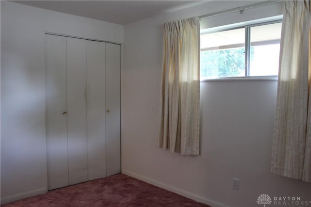 4912 Powell Rd, Huber Heights, OH 45424 - unfurnished bedroom featuring carpet floors and a closet