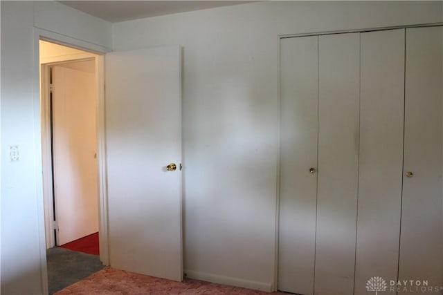 4912 Powell Rd, Huber Heights, OH 45424 - unfurnished bedroom with carpet flooring and a closet