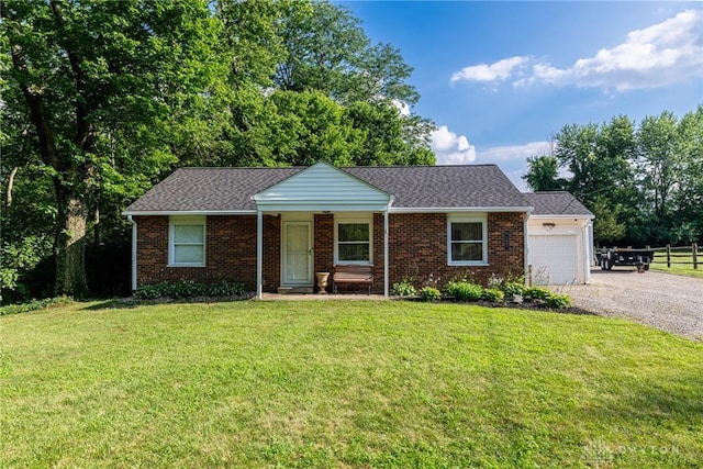 1097 Trudy Ct, Clearcreek Twp, OH 45036 - ranch-style home with gravel driveway, an attached garage, brick siding, and a shingled roof