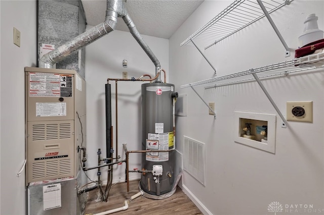5979 Timbergate Trl, Dayton, OH 45424 - utility room with water heater and heating unit