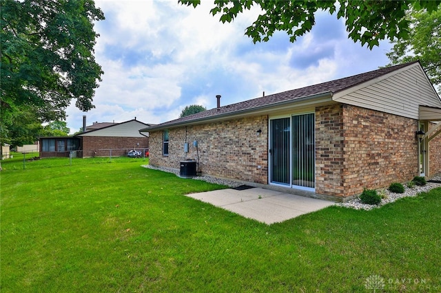 5979 Timbergate Trl, Dayton, OH 45424 - rear view of house featuring brick siding and a patio
