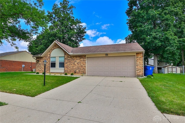 5979 Timbergate Trl, Dayton, OH 45424 - single story home with driveway, a front lawn, a garage, and brick siding