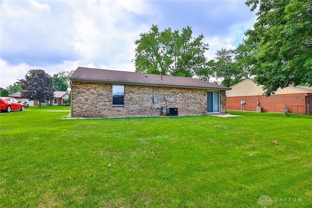 5979 Timbergate Trl, Dayton, OH 45424 - back of house featuring brick siding