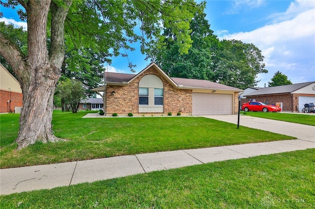 5979 Timbergate Trl, Dayton, OH 45424 - ranch-style house featuring a front lawn, driveway, brick siding, and an attached garage