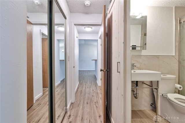 5979 Timbergate Trl, Dayton, OH 45424 - bathroom featuring a textured ceiling and wood finished floors