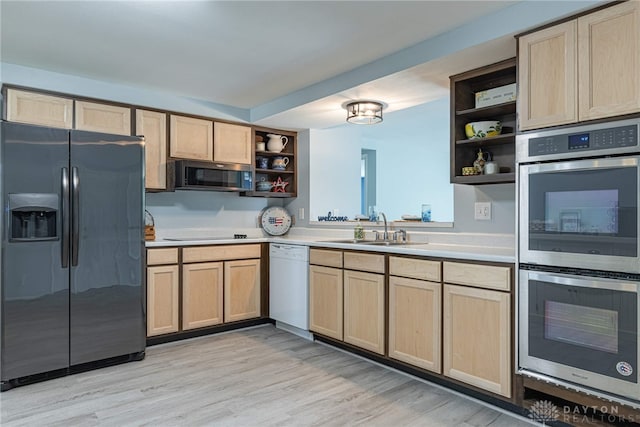 5970 Clearlake Dr, Dayton, OH 45424 - kitchen featuring open shelves, appliances with stainless steel finishes, light brown cabinets, light countertops, and light wood-type flooring