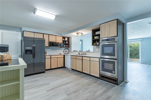 5970 Clearlake Dr, Dayton, OH 45424 - kitchen featuring open shelves, stainless steel appliances, light brown cabinetry, light wood-style flooring, and light countertops
