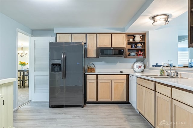 5970 Clearlake Dr, Dayton, OH 45424 - kitchen featuring stainless steel appliances, light wood-style floors, light countertops, light brown cabinetry, and open shelves