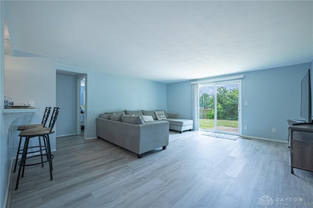 5970 Clearlake Dr, Dayton, OH 45424 - living area with light wood-style floors and baseboards