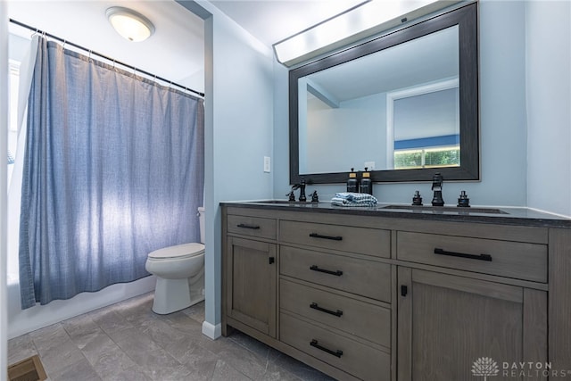 5970 Clearlake Dr, Dayton, OH 45424 - bathroom featuring double vanity and shower / bath combination with curtain