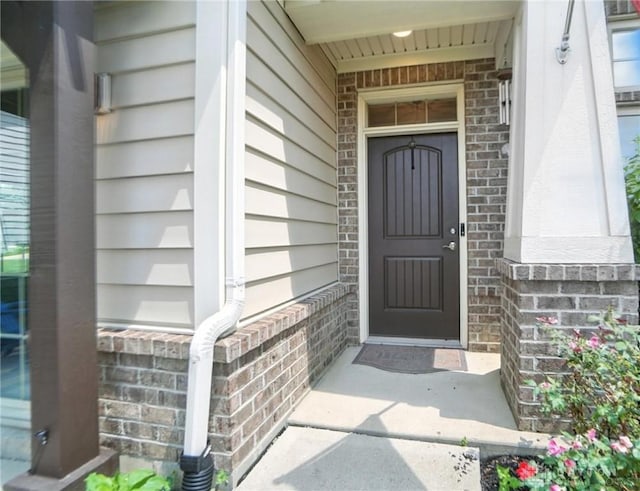 1310 Bourdeaux Way, Clearcreek Twp, OH 45458 - view of exterior entry featuring brick siding