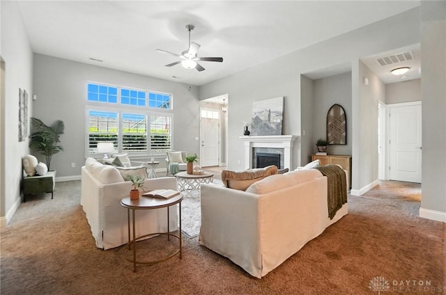 1310 Bourdeaux Way, Clearcreek Twp, OH 45458 - carpeted living room featuring a fireplace and ceiling fan