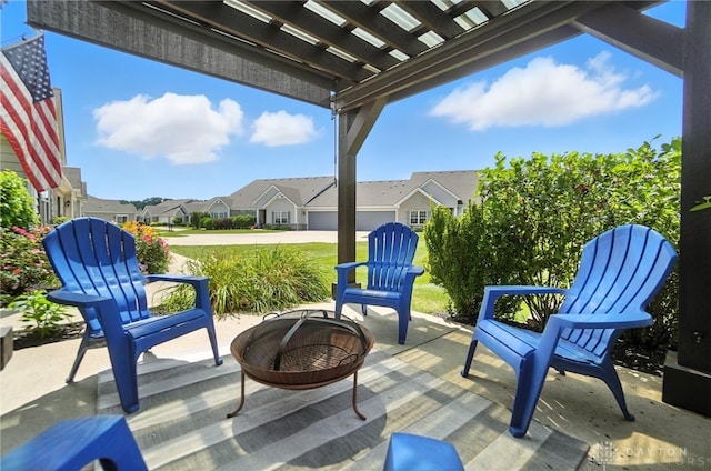 1310 Bourdeaux Way, Clearcreek Twp, OH 45458 - view of patio with an outdoor fire pit, a residential view, and a pergola