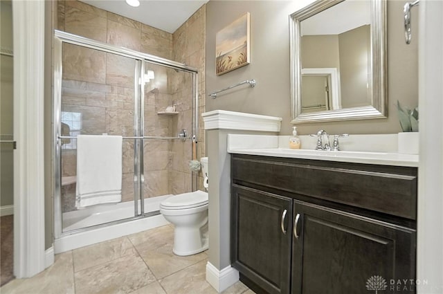 1310 Bourdeaux Way, Clearcreek Twp, OH 45458 - full bathroom with a shower stall, vanity, and tile patterned flooring