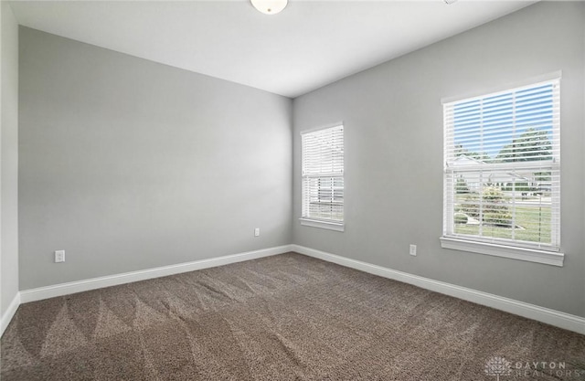 1310 Bourdeaux Way, Clearcreek Twp, OH 45458 - empty room with plenty of natural light and carpet flooring