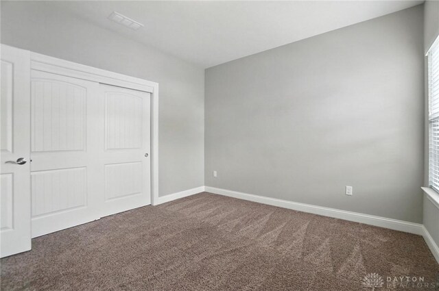 1310 Bourdeaux Way, Clearcreek Twp, OH 45458 - unfurnished bedroom with carpet floors and a closet