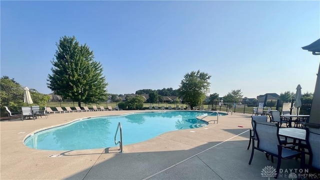 1310 Bourdeaux Way, Clearcreek Twp, OH 45458 - community pool with a patio