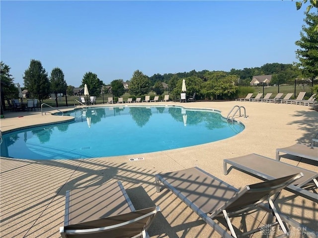 1310 Bourdeaux Way, Clearcreek Twp, OH 45458 - community pool featuring a patio area