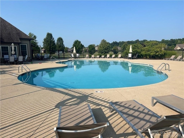 1310 Bourdeaux Way, Clearcreek Twp, OH 45458 - community pool featuring a patio