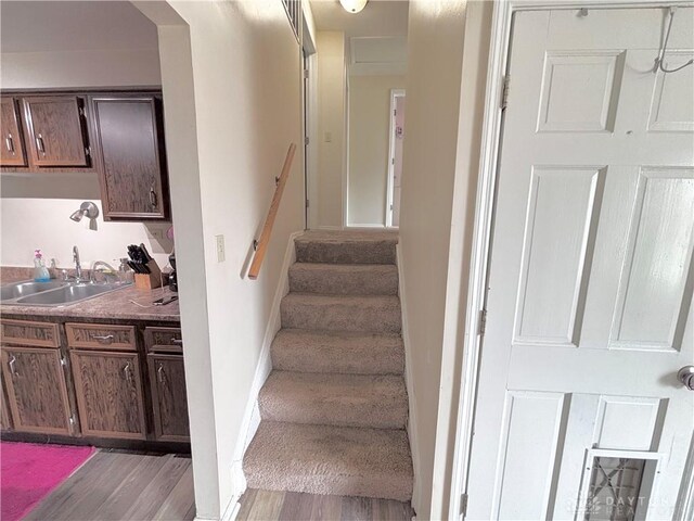 11629 Pippin Rd, Colerain Twp, OH 45231 - stairs with wood finished floors and arched walkways