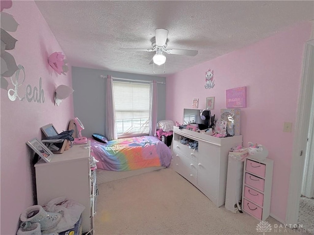 11629 Pippin Rd, Colerain Twp, OH 45231 - bedroom featuring light colored carpet, a textured ceiling, and a ceiling fan