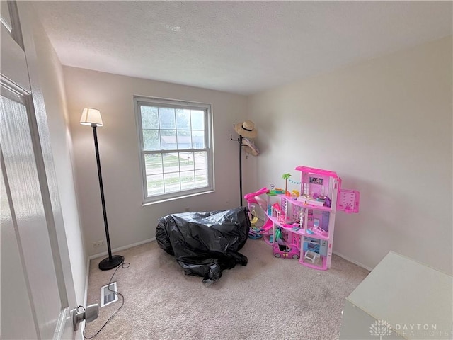 11629 Pippin Rd, Colerain Twp, OH 45231 - carpeted bedroom with a textured ceiling and baseboards