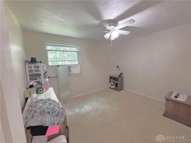 11629 Pippin Rd, Colerain Twp, OH 45231 - bedroom featuring a textured ceiling, carpet, and a ceiling fan