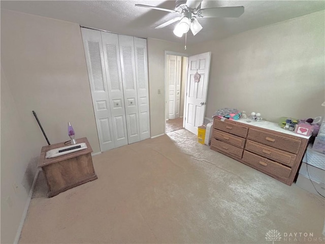 11629 Pippin Rd, Colerain Twp, OH 45231 - bedroom with a closet, light colored carpet, and a ceiling fan