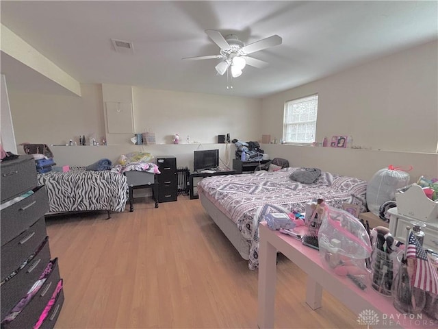 11629 Pippin Rd, Colerain Twp, OH 45231 - bedroom with light wood-style floors and ceiling fan