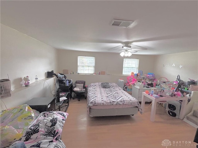 11629 Pippin Rd, Colerain Twp, OH 45231 - bedroom with wood finished floors and ceiling fan