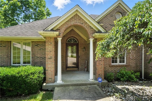 5567 Day Rd, Colerain Twp, OH 45252 - property entrance with brick siding and roof with shingles