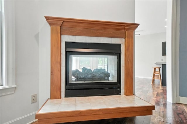 5567 Day Rd, Colerain Twp, OH 45252 - detailed view of wood finished floors and a fireplace