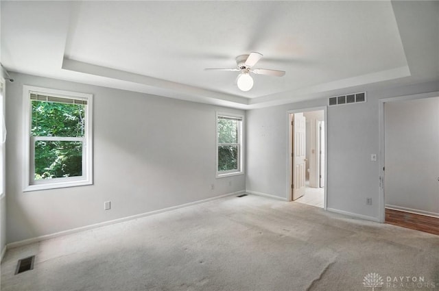 5567 Day Rd, Colerain Twp, OH 45252 - carpeted spare room with a raised ceiling and a ceiling fan