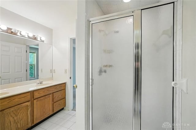 5567 Day Rd, Colerain Twp, OH 45252 - bathroom featuring a stall shower, double vanity, and tile patterned flooring