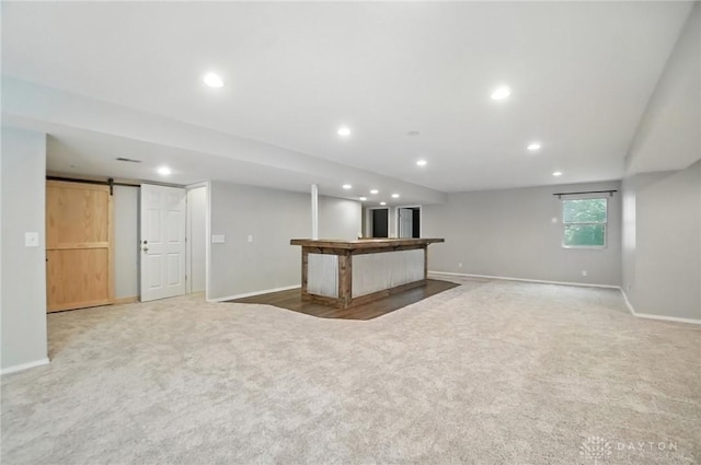 5567 Day Rd, Colerain Twp, OH 45252 - below grade area with carpet floors, recessed lighting, and a barn door