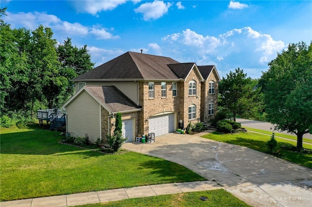 213 Bentridge Dr, Clearcreek Twp, OH 45458 - view of front of house featuring a garage, concrete driveway, a front lawn, brick siding, and roof with shingles