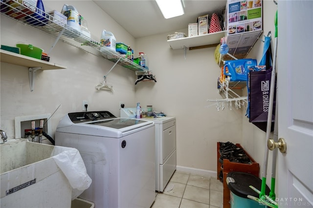 213 Bentridge Dr, Clearcreek Twp, OH 45458 - washroom featuring separate washer and dryer and light tile patterned floors