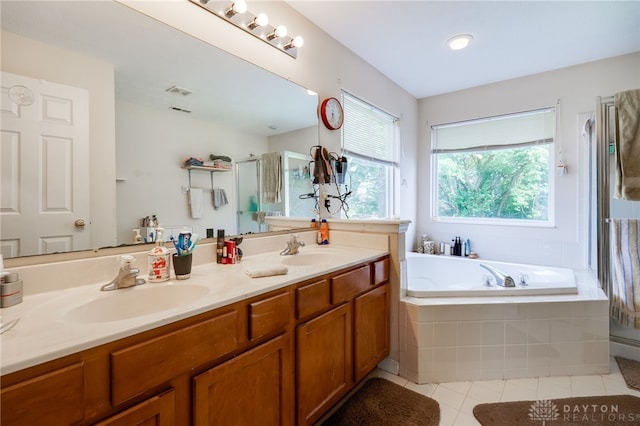 213 Bentridge Dr, Clearcreek Twp, OH 45458 - bathroom featuring double vanity, a stall shower, a bath, and tile patterned floors
