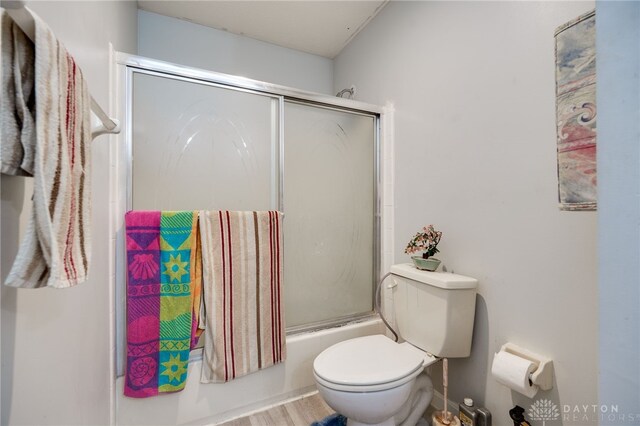 213 Bentridge Dr, Clearcreek Twp, OH 45458 - full bath with enclosed tub / shower combo and wood finished floors