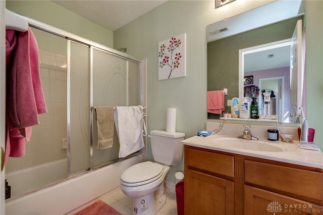 213 Bentridge Dr, Clearcreek Twp, OH 45458 - bathroom with vanity, combined bath / shower with glass door, and tile patterned flooring