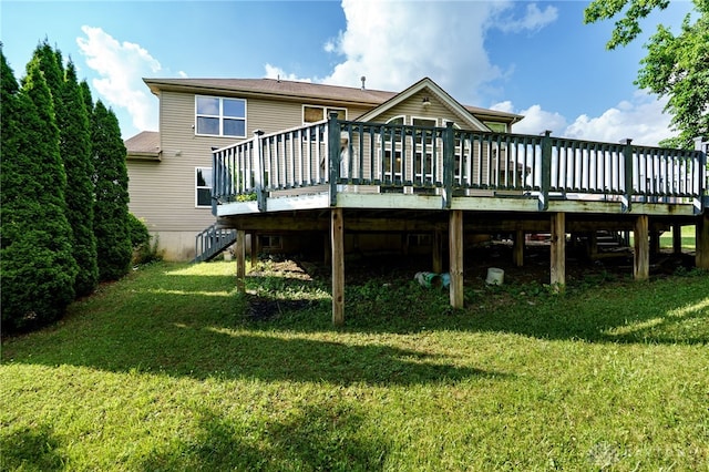 213 Bentridge Dr, Clearcreek Twp, OH 45458 - back of property featuring a deck, a lawn, and stairs
