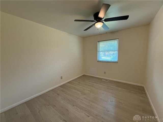 4220 Sillman Pl, Kettering, OH 45440 - empty room with light wood finished floors and ceiling fan