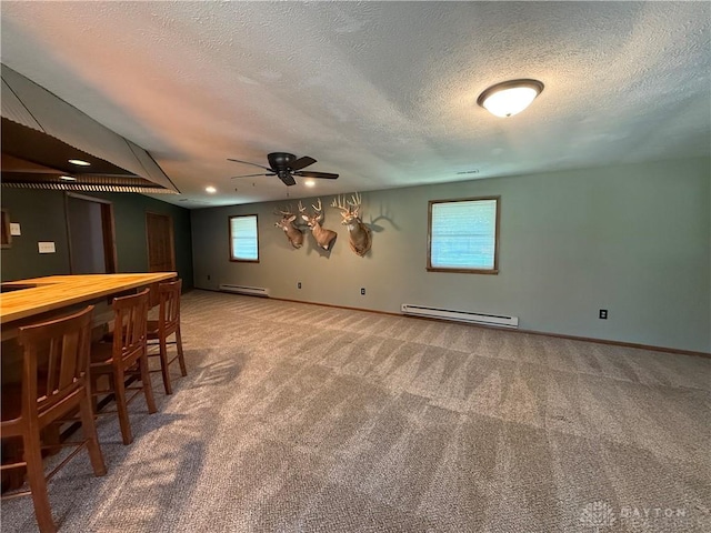 4220 Sillman Pl, Kettering, OH 45440 - unfurnished room featuring carpet floors, a ceiling fan, a textured ceiling, baseboard heating, and recessed lighting