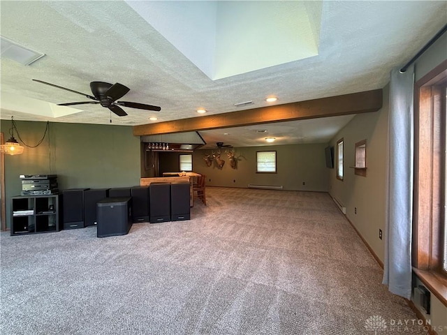 4220 Sillman Pl, Kettering, OH 45440 - unfurnished living room featuring carpet flooring, a textured ceiling, ceiling fan, a baseboard heating unit, and recessed lighting