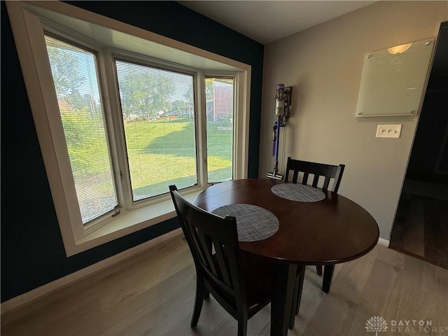 4220 Sillman Pl, Kettering, OH 45440 - dining area with wood finished floors and baseboards
