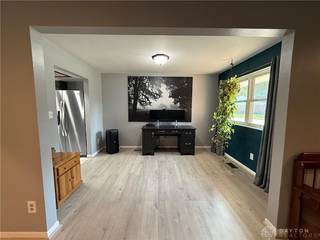 4220 Sillman Pl, Kettering, OH 45440 - living room featuring light wood finished floors and baseboards