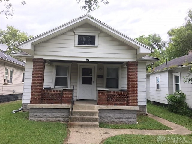 bungalow-style house featuring covered porch