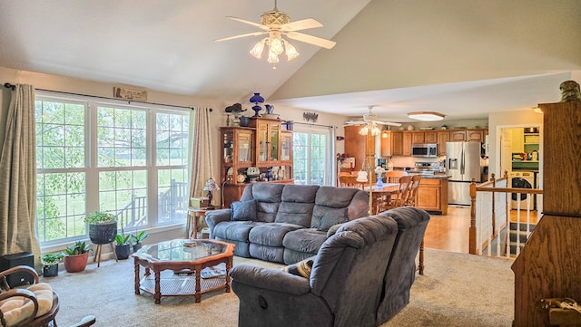 26484 State Highway 3, Kirksville, MO 63501 - living room with ceiling fan, washer / clothes dryer, and high vaulted ceiling