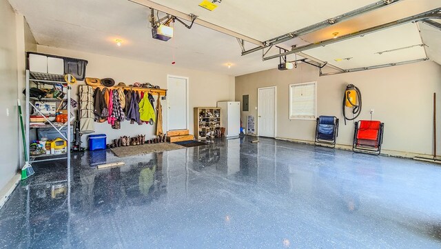26484 State Highway 3, Kirksville, MO 63501 - garage featuring electric panel and a garage door opener