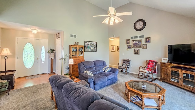 26484 State Highway 3, Kirksville, MO 63501 - carpeted living room with high vaulted ceiling and a ceiling fan